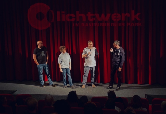 Die Lichtwerk-Geschäftsführung: Köhring, Hofmann und Goßmann mit Moderator Ronald Herzog